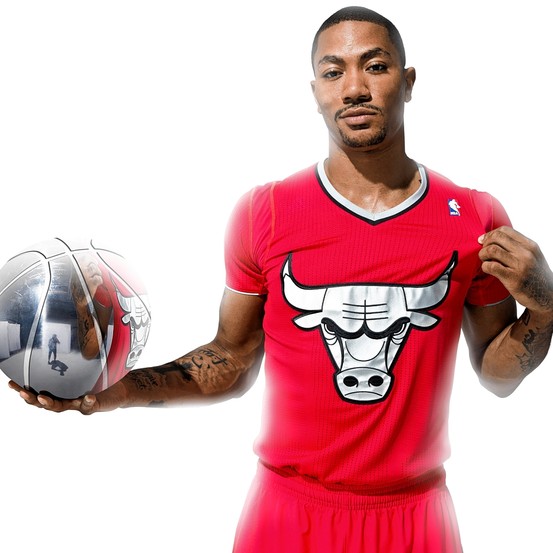 Chicago Bulls guard Derrick Rose models the new sleeved jerseys in the pre-season.