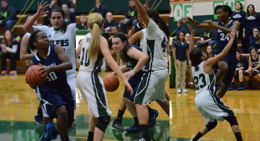 Sophomore Brenda Pennington, senior Elena Sobilo and sophomore Naomi House dominate against Whiting on Jan. 21