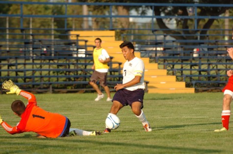 Gabe Anguiano, senior, shoots past a Hebron player