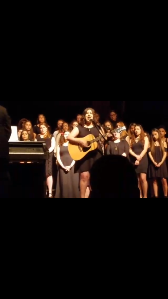 Senior, Mayra Pena preforming a solo at Band and Choir concert. 