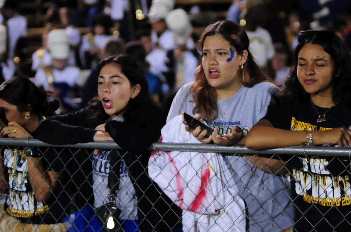 Groaning as Mr. Kevin Smith, guidance counselor, purposely stalls in announcing the name of the Homecoming queen,seniors Juliette Ortiz, Naomi Quiroz, and Aleni Vasquez grow eager to see who is crowned at the BNI Homecoming game against Lake Station on Sept. 16.“We were growing impatient during the excitement of waiting for Mr. Smith to announce the Homecoming Queen,” Vazquez said.