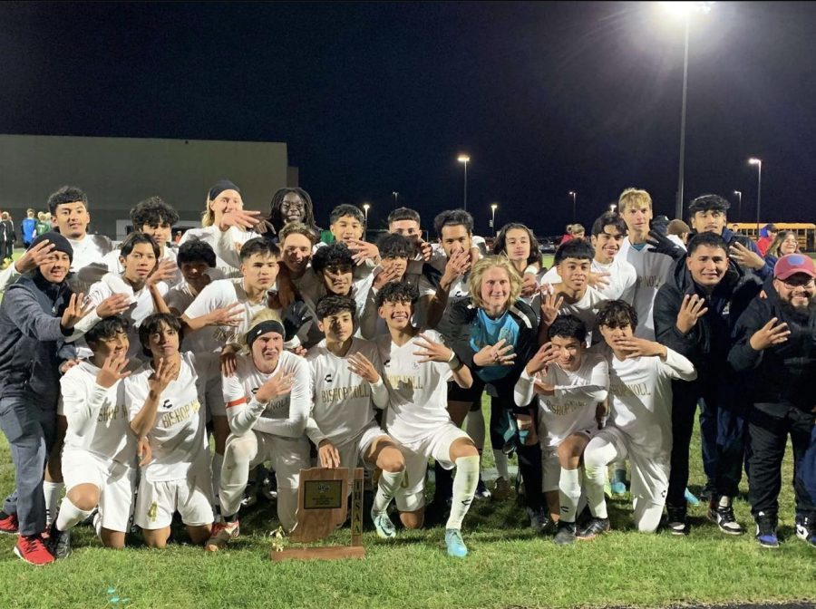 Taking it all in.
Bishop Nolls soccer team poses with their sectional trophy,after beating Illiana Christian High School for the sectional championship 4-0 on October 8th.